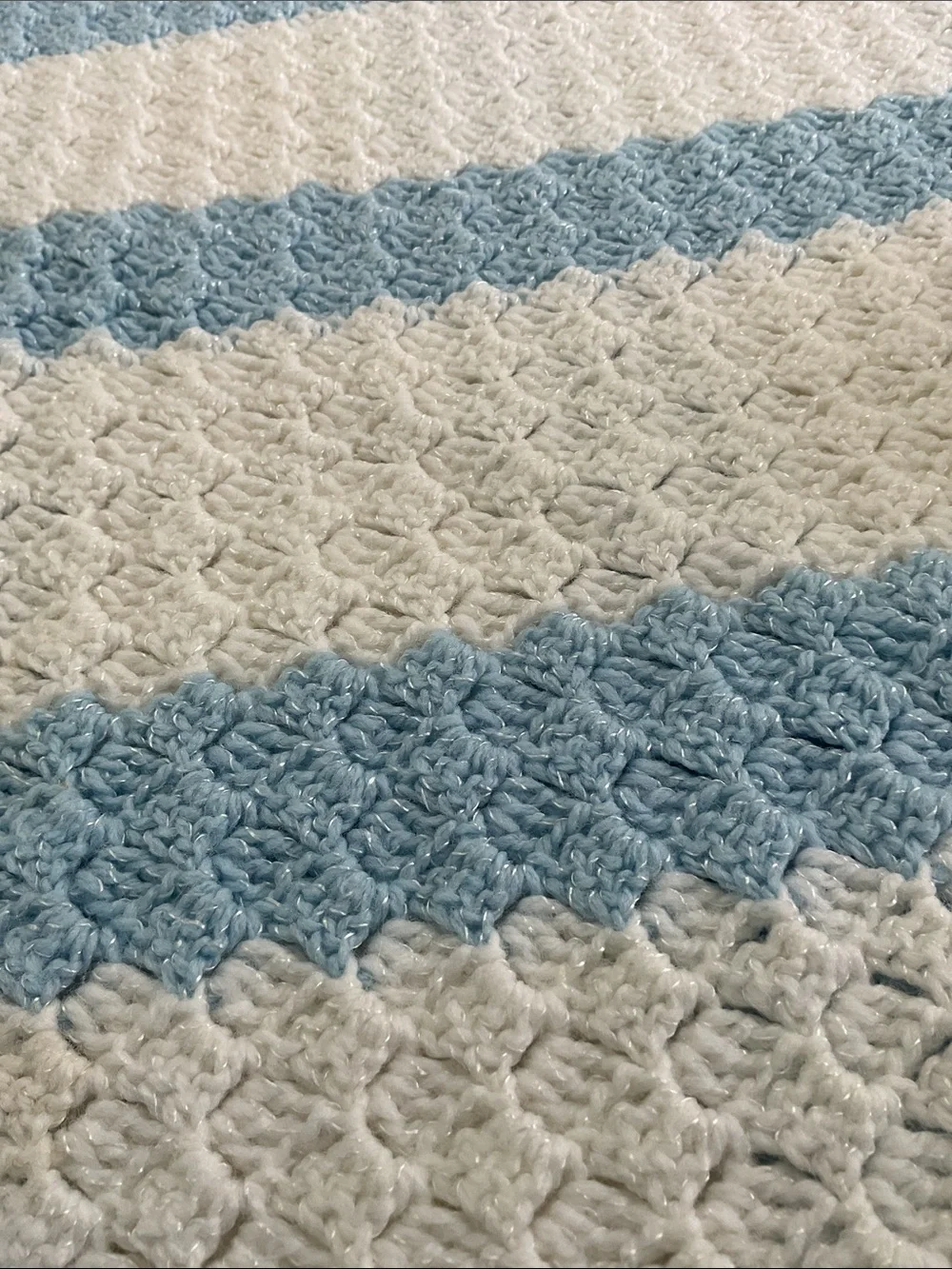 Baby blanket. Hand crocheted. Blue and white.